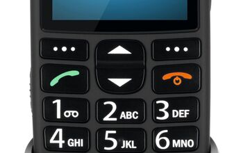 Ansicht auf das schwarze Handtelefon im schwarzen Ständer.